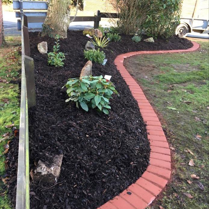 Work carried out by Heaney Landscapes using Mini-Chip Bark